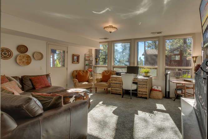 Lower level family room with walk off to brick patio | Lake Tahoe Luxury Real Estate