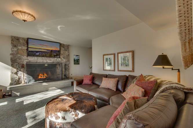 Lower level family room with walk off to brick patio | Luxury Lake Tahoe Real Estate