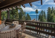 Balcony off the living room featuring majestic views