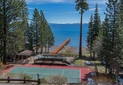 View from the condo of HOA Tennis Courts, Pool, Extended Pier and Lake
