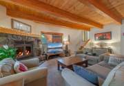 Spacious living room with wood fireplace | 12136 Brookstone Drive