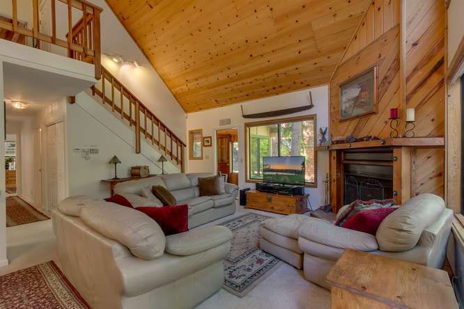 Spacious living room with vaulted pine ceilings| Kings Beach Real Estate