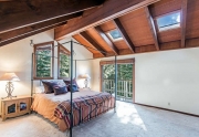 Master Bedroom Featuring Vaulted Ceilings