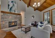 Beautiful living room with stone fireplace | 16479 Northwoods Blvd.
