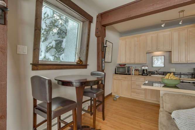 Dining Table and Added Skylight in Remodeled Alpine Meadows Townhouse For Sale
