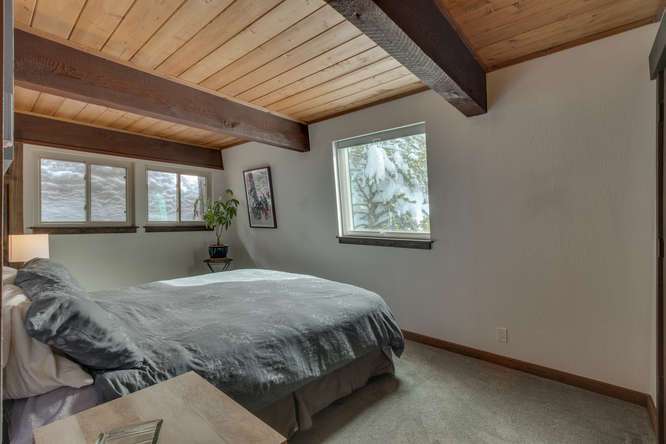 Spacious Master Bedroom featuring bonus Skylight in Lake Tahoe Condo For Sale
