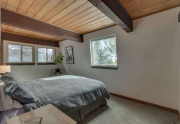 Spacious Master Bedroom featuring bonus Skylight in Lake Tahoe Condo For Sale