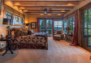 Majestic Master Bedroom with numerous picture windows framing Sierra Crest views | Martis Valley Real Estate