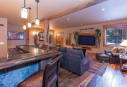 Saloon featuring bar, pool table, media area and bathroom | Northstar Real Estate