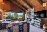 Open and Spacious Living Room with Rock Fireplace