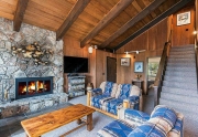 Open and Spacious Living Room with Rock Fireplace