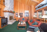 Large Living Area with floor to cieling stone fireplace