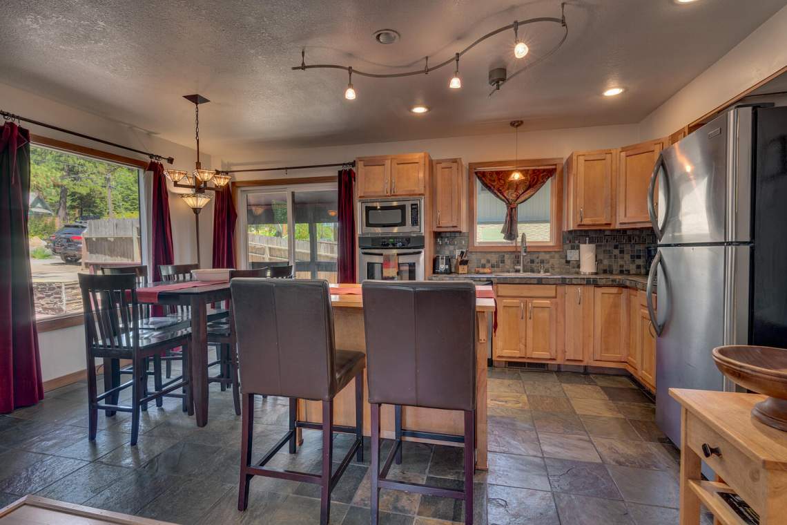 Beautiful kitchen and dining area | 9842 North Lake Blvd.