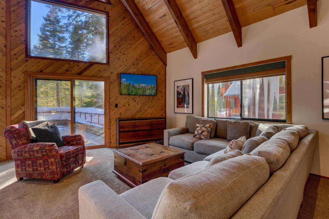 Living room with picture windows | 3502 Chamonix Rd.