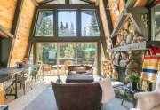 Gorgeous living room with picture windows | Alpine Meadows Home