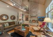 Living area with vaulted ceilings | 12882 Falcon Point Pl.