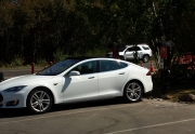 Tesla Model S Charging at Oliver Luxury Real Estate