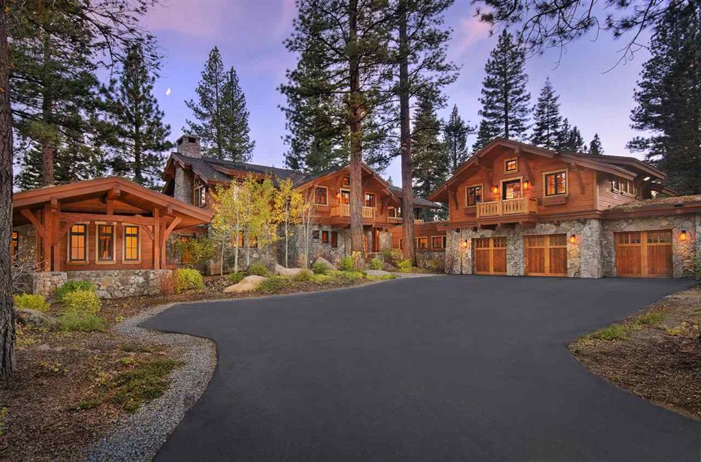 8458 Valhalla Drive | Truckee Luxury Real Estate, image of large redwood and stone home with driveway and trees in the background