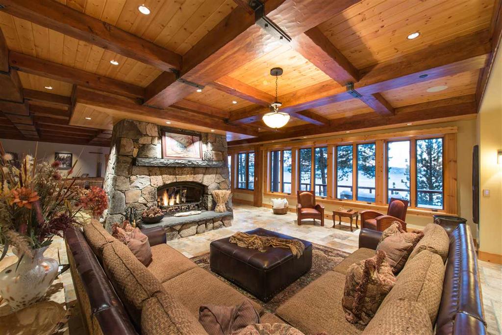 1780 North Lake Blvd | Lake Tahoe Luxury Home, tahoe city home for sale image of inside woodwork and view through windows with fireplace