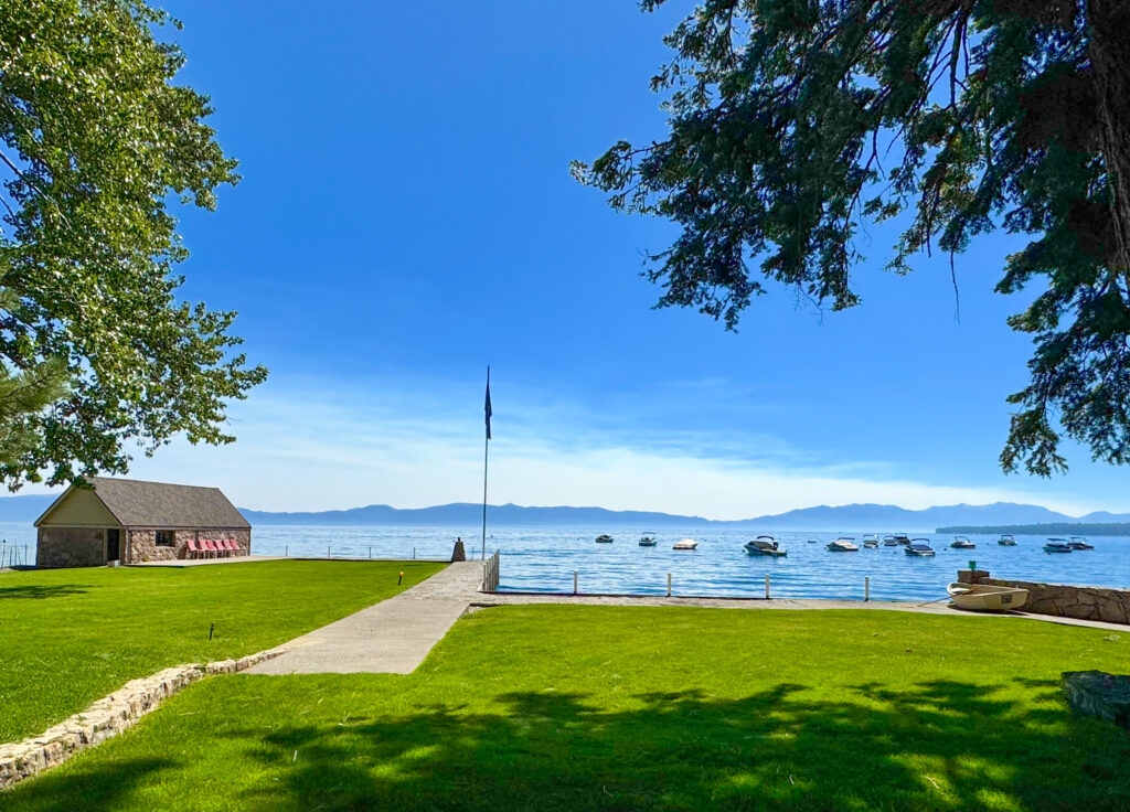 Homewood lakefront with boathouse and breakwater