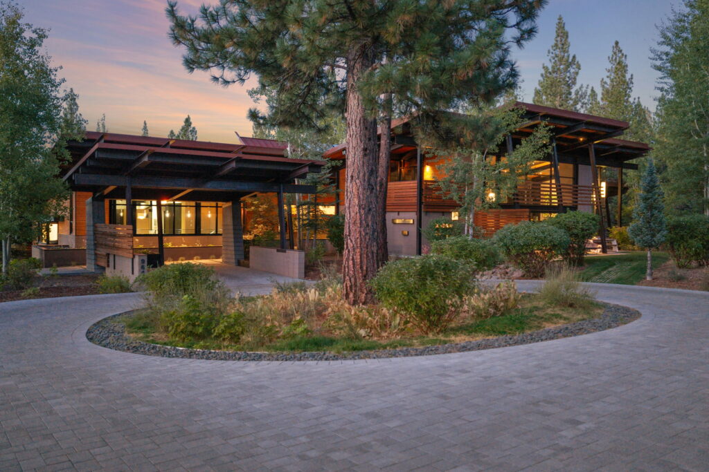9612 Dunsmuir Way | Luxury Martis Camp Estate in Truckee Contemporary luxury home at 9612 Dunsmuir Way in Martis Camp, Truckee, photographed at dusk among pine trees